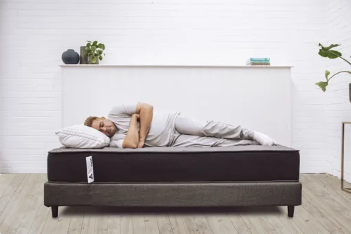 Man-sleeping-on-Sleep-Firm-Mattress-1