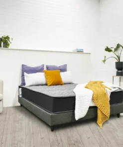 Sleep-Firm-Mattress-with-yellow-Blanket